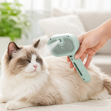 Cat being groomed with the 4-in-1 steam pet grooming brush